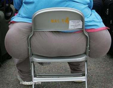 http://www.habeeb.com/images/funny.photos/funny_chair_doesnt_fit.jpg
